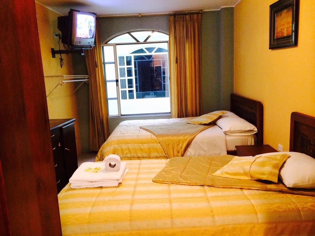 Hostal Grand Rio Baños Pokoj fotografie